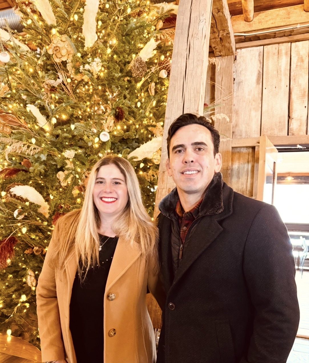 Will Gordon with family at a Christmas tree